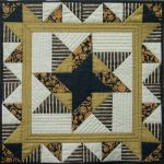 Black and gold patchwork quilt