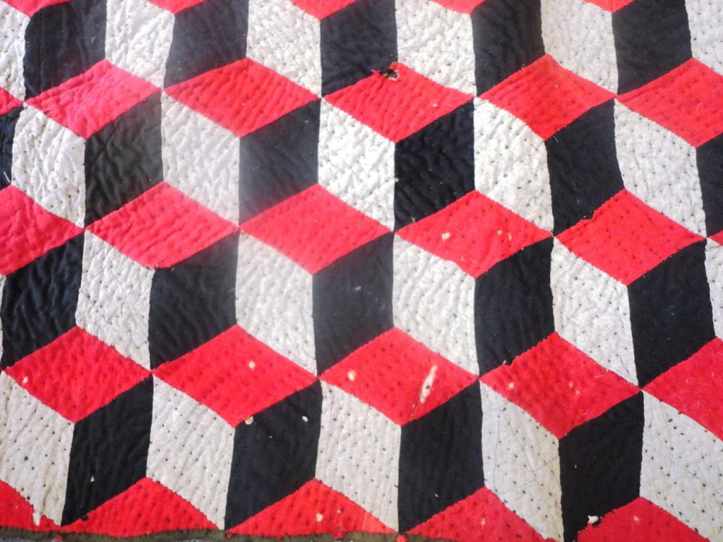 Red, grey and black tessellating diamonds