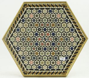 Hexagonal framed piece of silk ribbon patchwork