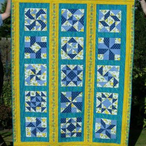 Blue and yellow sampler quilt