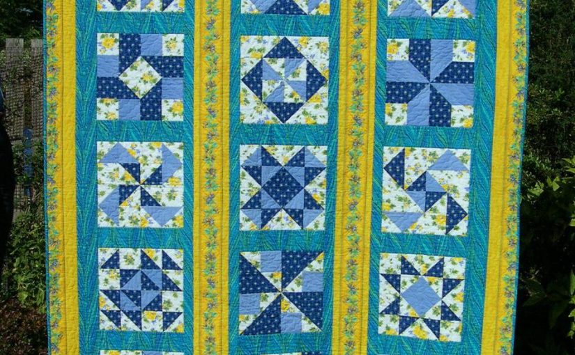 Blue and yellow sampler quilt