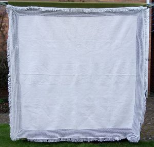 White tablecover with fringe