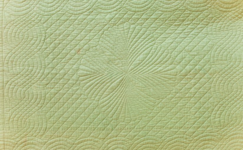 Quilt with fans and cables