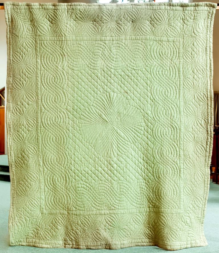 Green hand-quilted antique