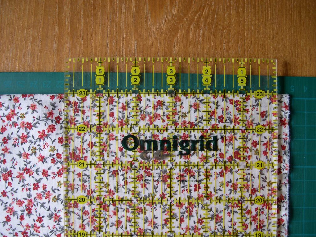 Quilters ruler with line along fold of fabric