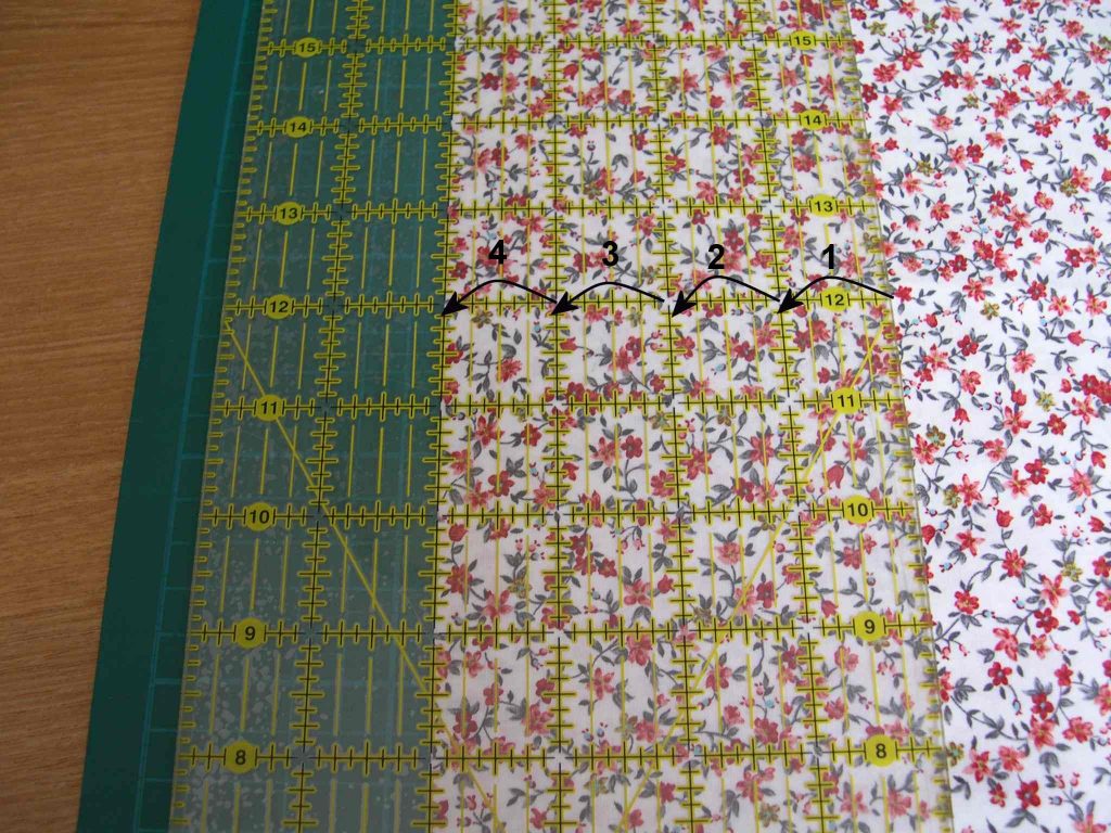 Ruler arranged with 4" of fabric underneath