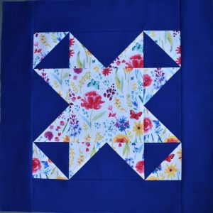 Flowery star on bright blue background