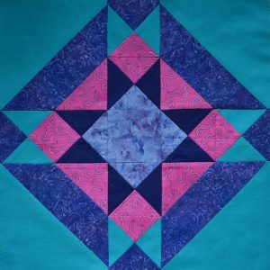 Blue, pink & turquoise star patchwork block