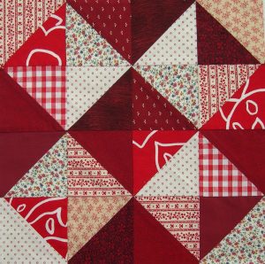 Scrappy red and white star block