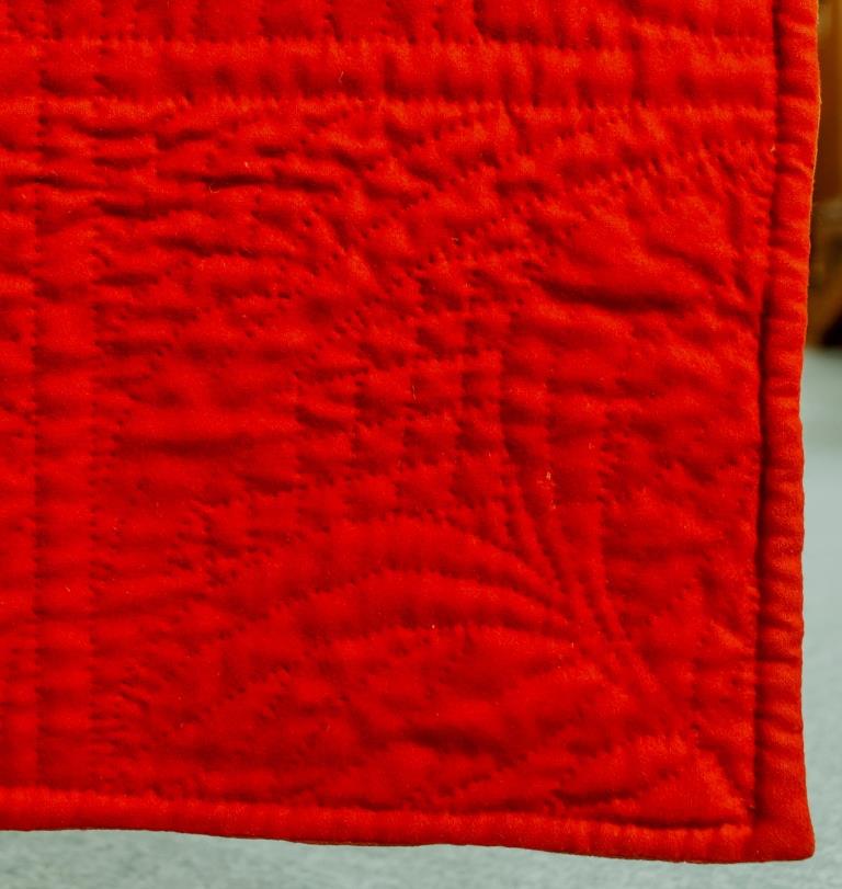 Hand-quilted motif