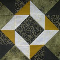 Green and mustard patchwork block