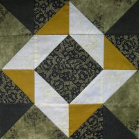 Green and mustard patchwork block