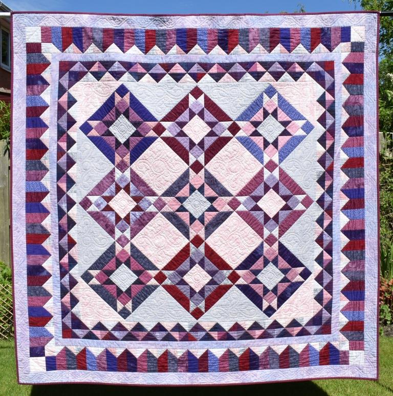 Pink & purple patchwork quilt