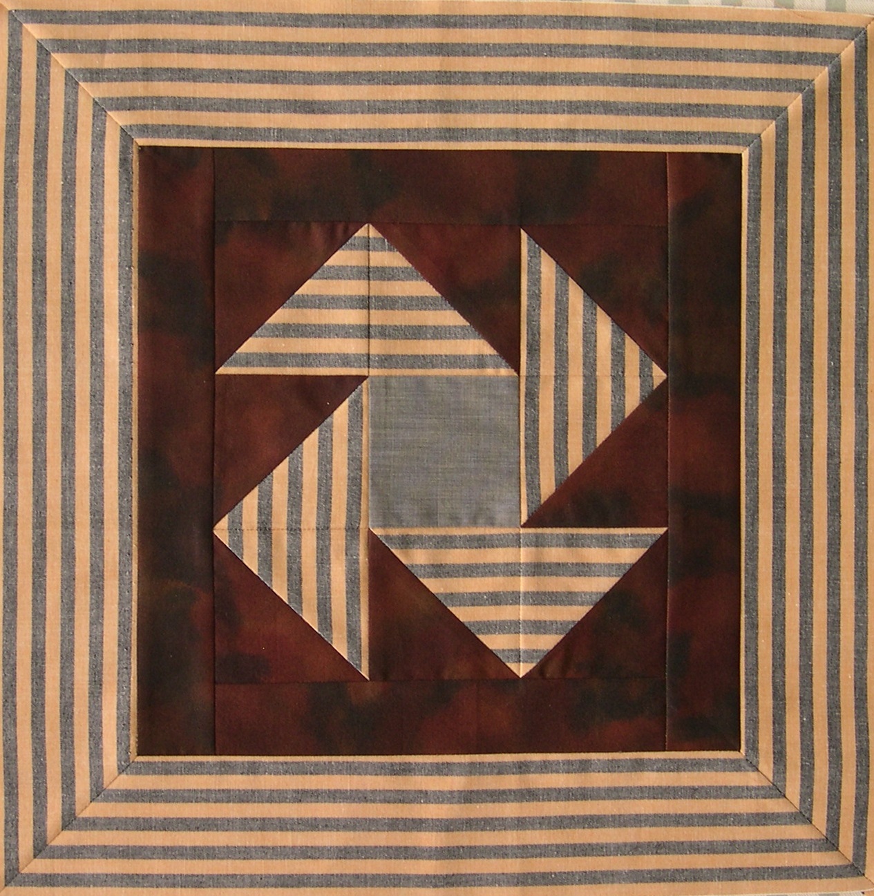 Border surrounding patchwork block