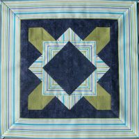 Blue, lime green and tut=rquoise block with striped border