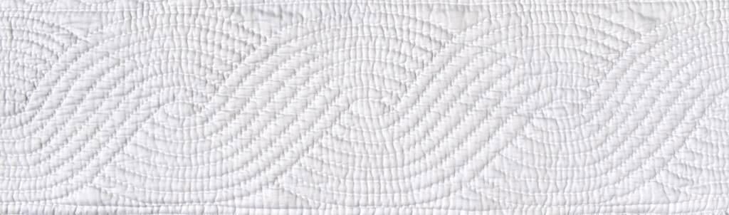 White quilted cable