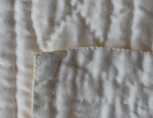 small oversewing stitches
