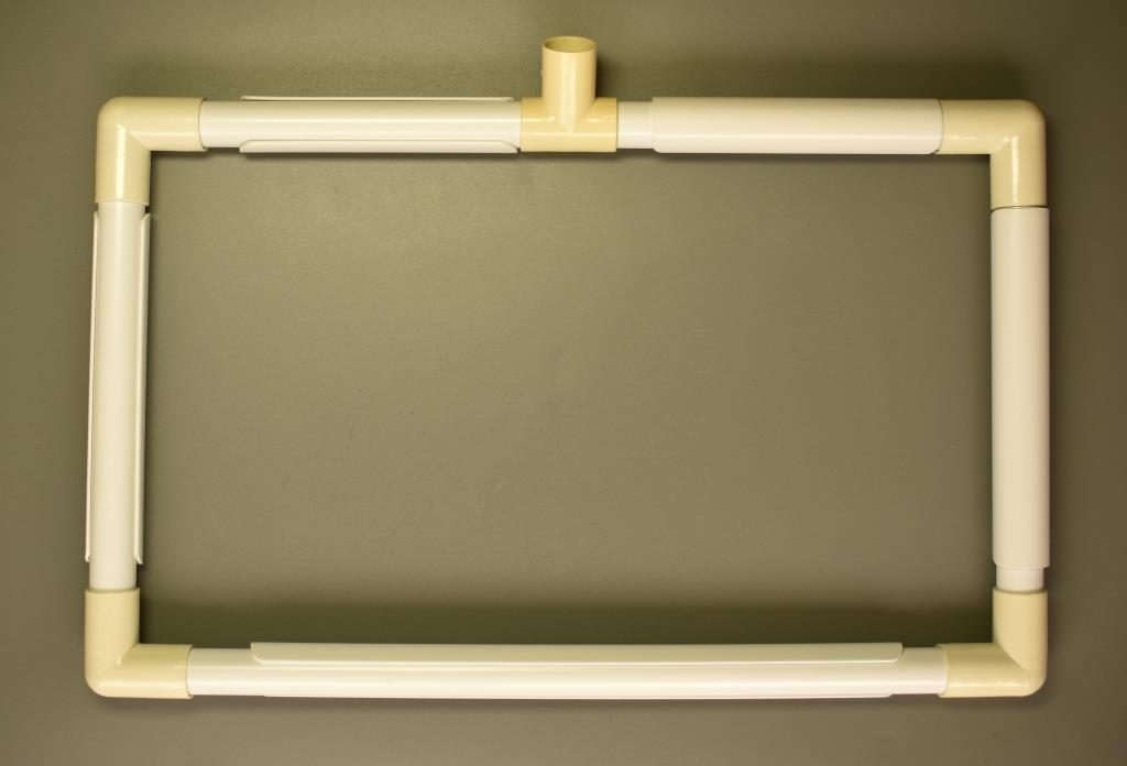 Rectangular white plastic frame with clips along tubing