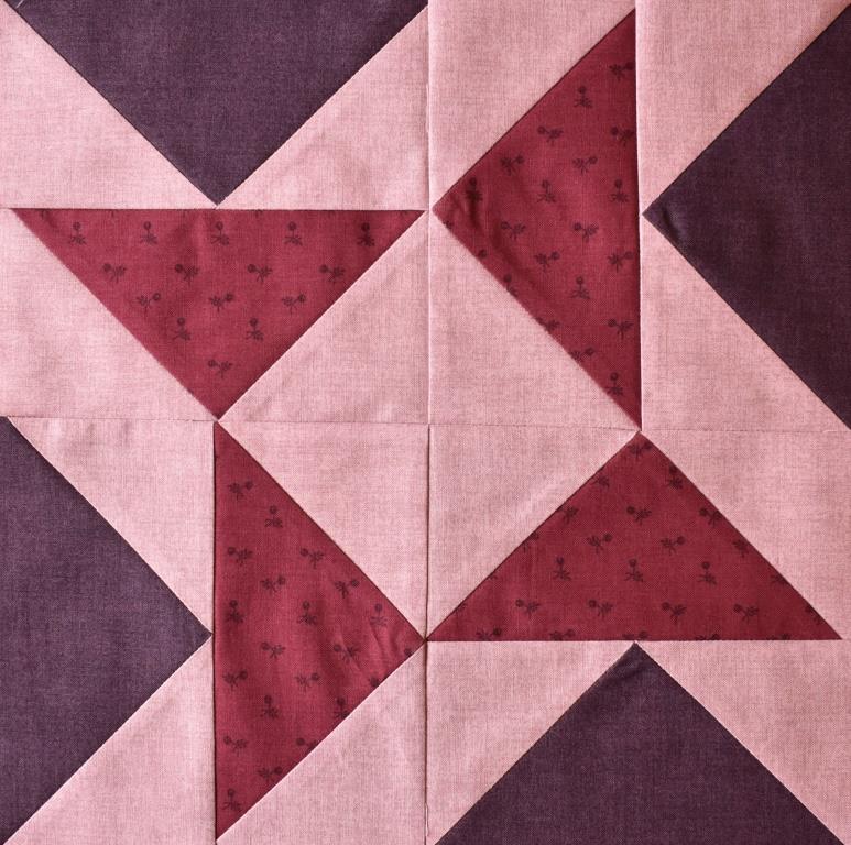 Deep pink & purple on pal pink patchwork block