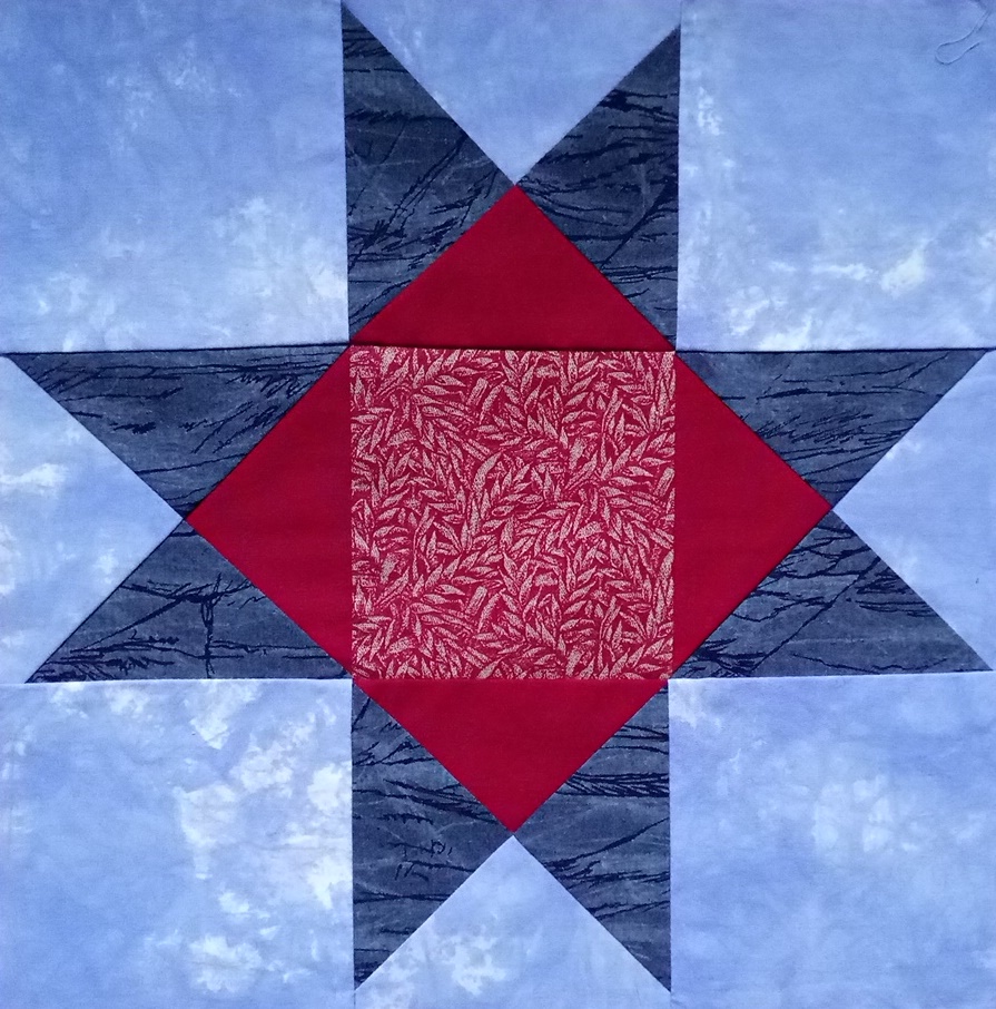 Blue and red Ohio Star block